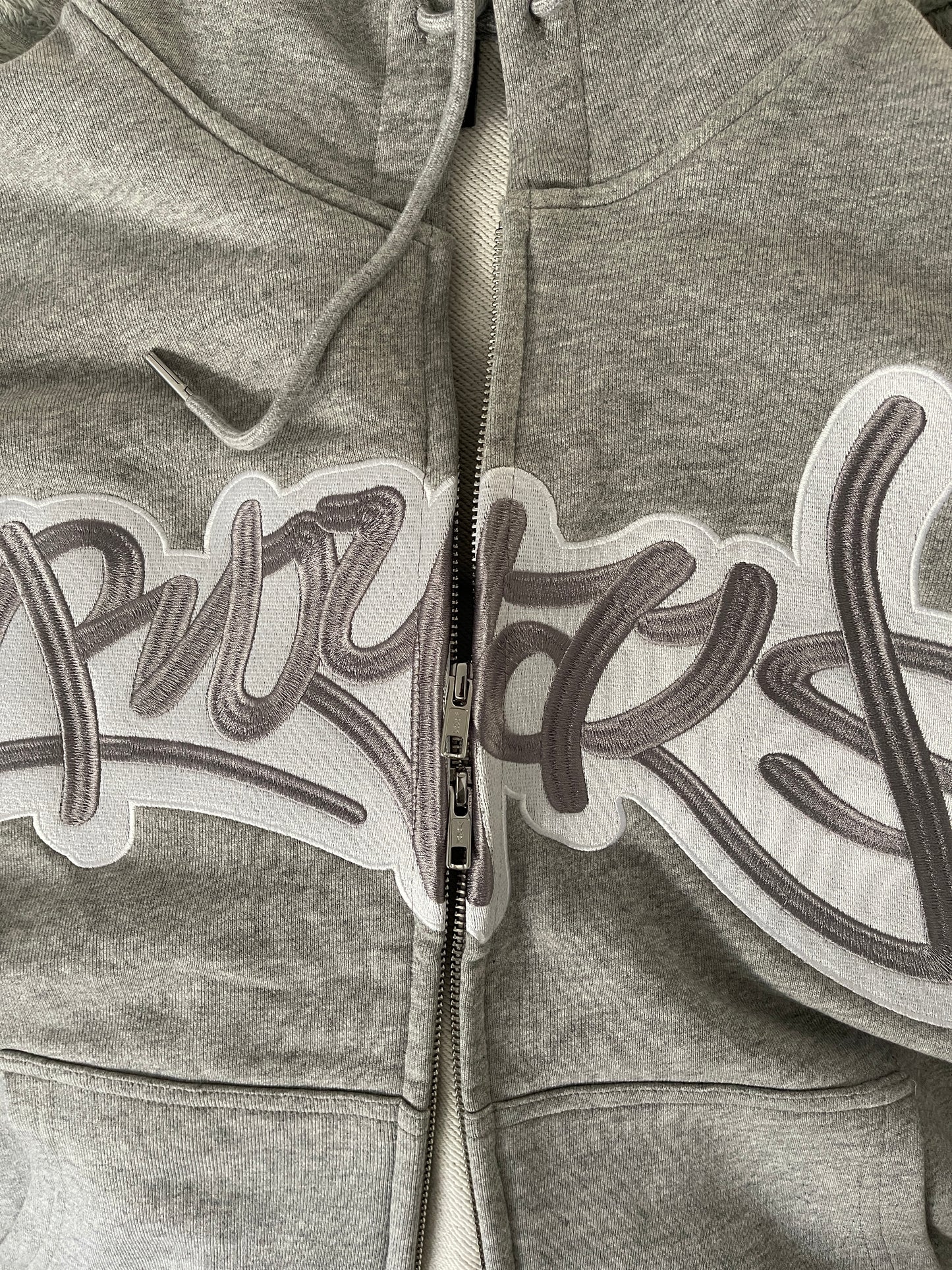 THE ROYALS ZIP UP SILVER HOODIE